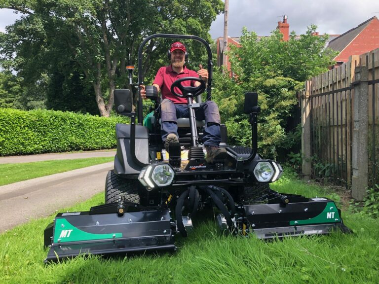 Town Council Grounds and Estates Officer sitting on a new mower
